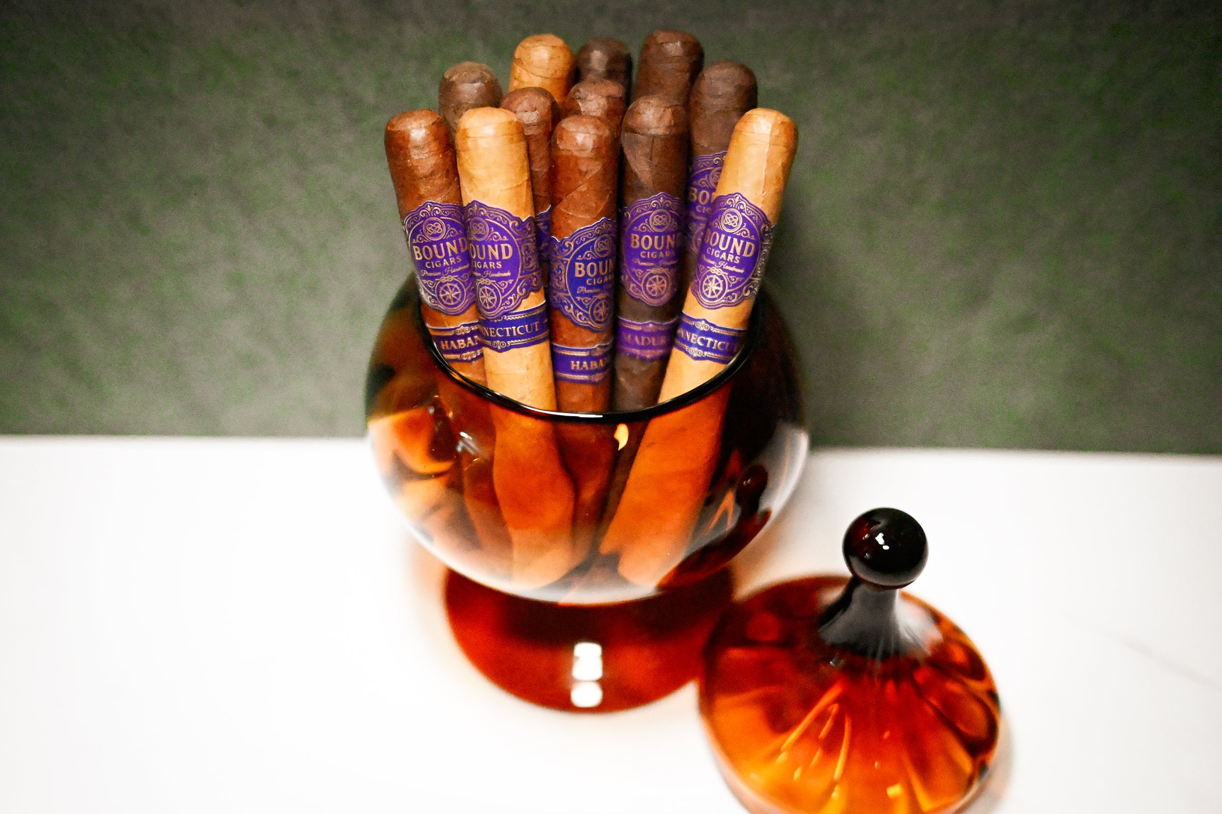 Northbound Connecticut, Habano, and Maduro cigars in an amber glass jar
